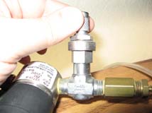 Adjusting the metering valve to get the desired bubble count